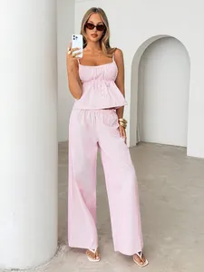 Pink and white striped camisole crop top and wide-leg pants set for women chic style