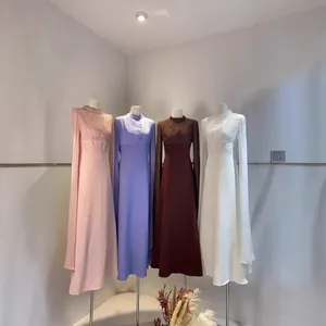Collection de robes maxi à taille haute avec manches longues fluides