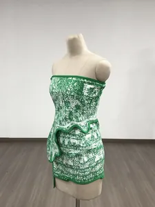 Side view of green and white jacquard tube top and mini skirt set on a mannequin