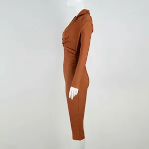 Side view of a brown long-sleeved bandage midi dress with twisted detail on a mannequin