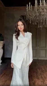 Elegant white asymmetrical blazer with silver floral textured maxi skirt evening set
