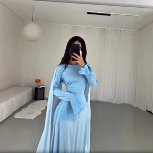 Light blue irregular long sleeve dress with ruffled cuffs and elegant cape detail.