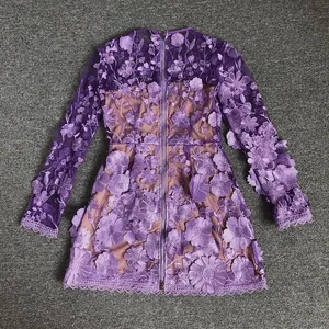 Detailed view of the purple floral lace embroidery on a long-sleeved mini party dress.