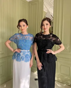 Elegantly detailed lace floral tops with pleated maxi skirts in stylish blue and black colors.
