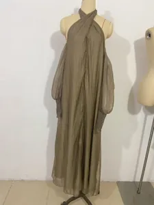 Elegant olive green halter neck maxi dress featuring cold-shoulder bishop sleeves and pleats.
