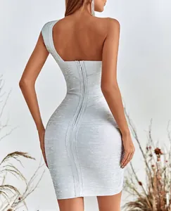 Detailed back view of a sparkling metallic silver one-shoulder bodycon bandage dress