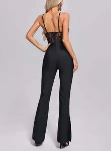 Rear view of black lace bandage jumpsuit with slim fit flared trousers and spaghetti straps.