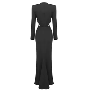 Back view of elegant black long-sleeve maxi dress with waist cut-outs and mermaid hem
