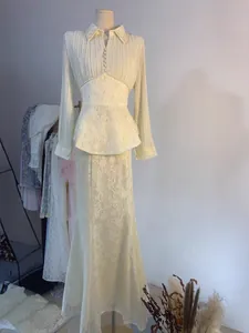 Elegant cream chiffon lace long sleeve pleated dress set displayed on a mannequin