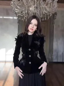 Vintage black velvet jacket with 3D butterfly appliqués and matching pleated skirt