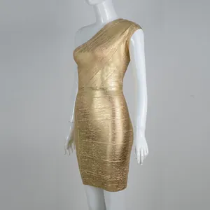 Detail view of a gold one-shoulder bandage bodycon dress with metallic finish texture