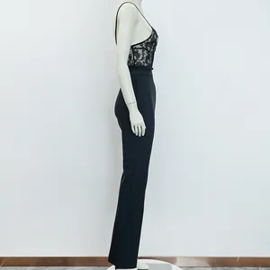 Side view of a black lace camisole jumpsuit with slim fit and corset bodice