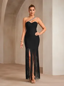 Detailed view of the black bandage dress featuring a sparkling rhinestone chain strap