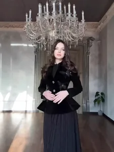 Elegant vintage velvet jacket with butterfly detail and pleated skirt set for women