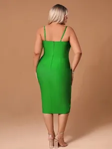 Back view of a vibrant green plus size bandage midi dress with spaghetti straps