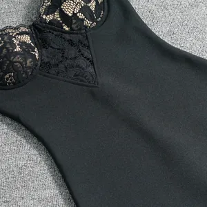 Close-up detail of elegant black lace and knit bandage fabric on a bodycon dress