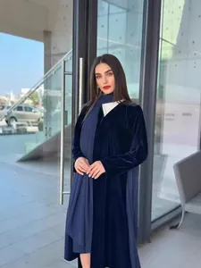 Elegant navy blue velvet long robe with pleated scarf shown on a female model outdoors