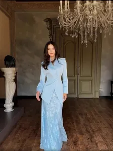 Elegant light blue satin blazer and floral textured skirt set for formal events
