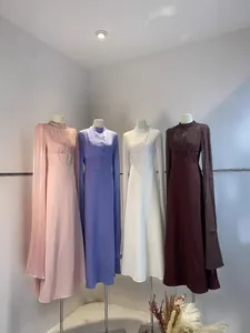Robe longue élégante à taille haute et manches cloche, disponible en quatre couleurs chic