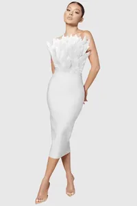 Detailed full view of white strapless ostrich feather top with bandage midi dress
