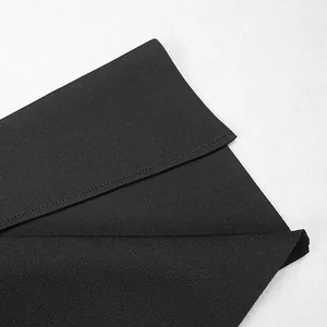 Close-up view of black elastic bandage fabric texture with precision stitching details