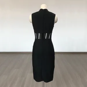 Elegant back view of black bandage dress featuring mesh waist cut-outs and rhinestones