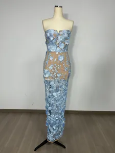 Full view of light blue strapless gown with elegant 3D floral embroidery details