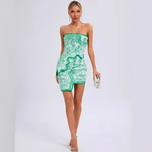 Fashionable green jacquard strapless bodycon dress featuring an irregular mini skirt
