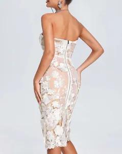 Elegant white lace strapless dress back view with 3D flowers and zipper closure