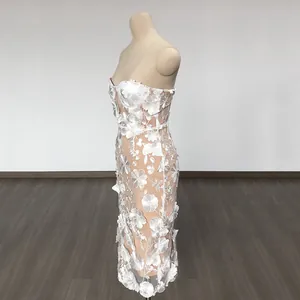 Side view of elegant white strapless midi dress with 3D floral lace embroidery