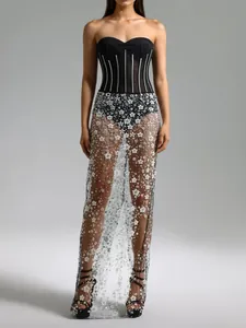 Elegant two-piece evening gown with sequined mesh skirt and strapless black bodysuit