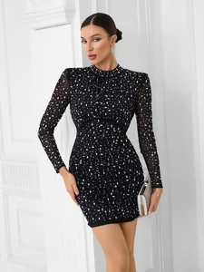 Detailed view of elegant black mesh bodycon mini dress with silver rhinestone studs