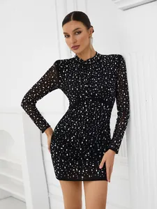Detailed view of elegant black mesh mini dress featuring sparkly rhinestone embellishments.