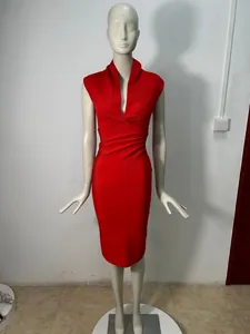 Detail view of a red deep V-neck sleeveless bodycon bandage evening dress on a mannequin.