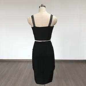 Detailed back view of a sexy black bandage two-piece set with rhinestone straps and zipper