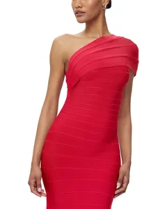 Close-up detail of a vibrant red one-shoulder bandage dress showing the ribbed texture
