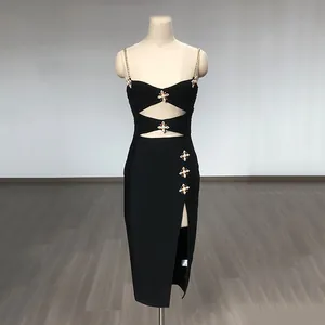 Elegant black bandage dress featuring rhinestone chain straps and high slit detail