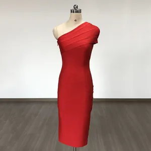 Detailed view of a vibrant red one-shoulder bodycon bandage evening dress on mannequin