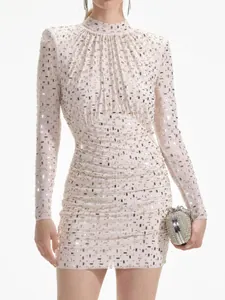 Elegant long sleeve bodycon mini dress with all-over crystal rhinestones on mesh