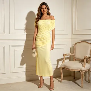Detailed view of the yellow off-the-shoulder ruched midi dress