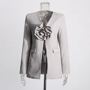 Front view of women's grey V-neck blazer with large 3D flower embellishment