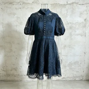 Elegant stand collar dress with intricate lace embroidery and puff sleeves details