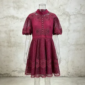 Full view of elegant burgundy lace dress featuring a mandarin collar and puff sleeves