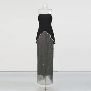 Detail view of French style beaded strapless top and sparkling sequin long skirt set