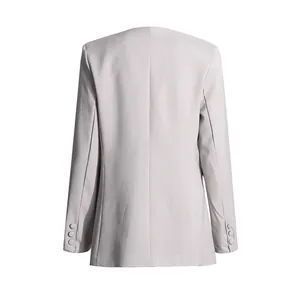 Back view of a light grey tailored blazer with elegant sleeve button details