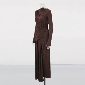 Detailed view of the elegant chocolate brown ruched maxi dress on a mannequin