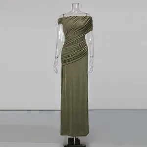 Close-up detail of the olive green Vietnamese style ruched off-the-shoulder maxi dress