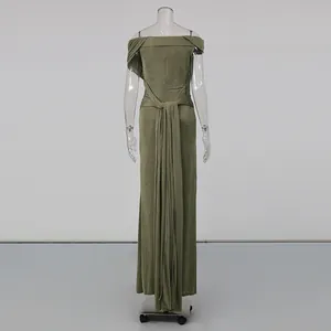 Rear view of an elegant olive green off-the-shoulder pleated maxi dress on a mannequin.
