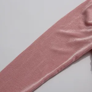 Close-up detail of the pink shimmery pleated fabric texture on this elegant long dress