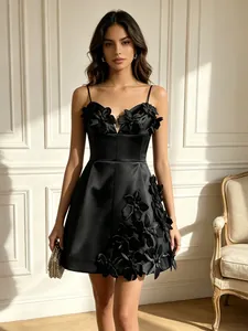 Elegant black A-line mini dress with 3D floral appliqués and thin spaghetti straps